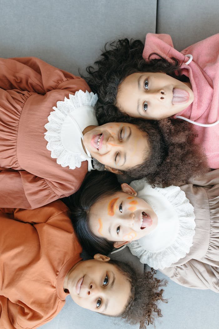 Children Lying Close in Opposite Directions